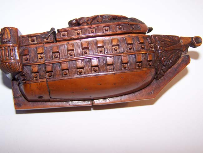 A Fine Napoleonic Period Carved Coquilla Nut Snuff Box in the Form of a 100 Gun Man-of-War circa 1795-1810.